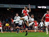 Kieran Gibbs of Arsenal scores his side's first goal during the Barclays Premier League match between Arsenal and Tottenham Hotspur at the Emirates Stadium on November 8, 2015
