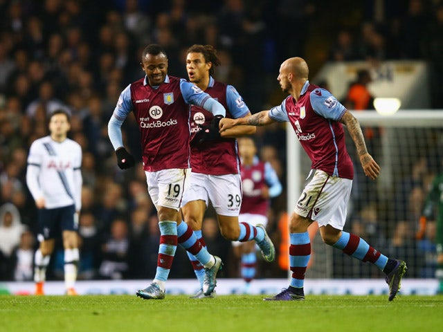 Jordan Ayew of Aston Villa (19) celebrates with Alan Hutton (21) as he scores their first goal during the Barclays Premier League match between Tottenham Hotspur and Aston Villa at White Hart Lane on November 2, 2015