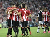 Athletic Bilbao players celebrate after scoring their team's second goal during the UEFA Europa League group L football match Athletic Club Bilbao vs FK Partizan at the San Mames stadium in Bilbao on November 5, 2015.