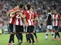 Athletic Bilbao players celebrate after scoring their team's second goal during the UEFA Europa League group L football match Athletic Club Bilbao vs FK Partizan at the San Mames stadium in Bilbao on November 5, 2015.