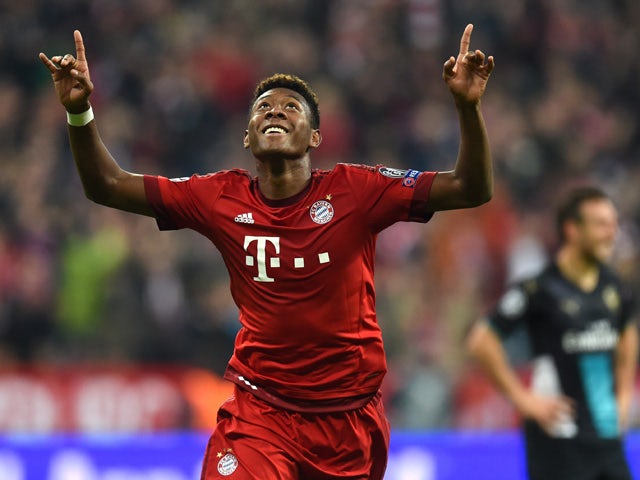 Bayern Munich's Austrian defender David Alaba celebrates after scoring the third goal during the UEFA Champions League Group F second-leg football match between FC Bayern Munich and Arsenal FC in Munich, southern Germany, on November 4, 2015