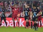 Bayern Munich's German striker Thomas Muller (3rd L) celebrates scoring with his teammates during the UEFA Champions League Group F second-leg football match between FC Bayern Munich and Arsenal FC in Munich, southern Germany, on November 4, 2015