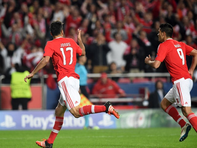 Benfica's Brazilian forward Jonas (L) celebrates after scoring the opening goal during the UEFA Champions League football match SL Benfica vs Galatasaray AS at the Luz stadium in Lisbon on November 3, 2015.