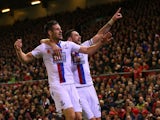Scott Dann of Crystal Palace (L) celebrates with Damien Delaney of Crystal Palace after scoring his side's second goal during the Barclays Premier League match between Liverpool and Crystal Palace at Anfield on November 8, 2015