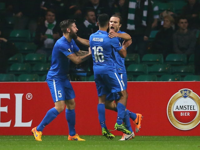 Daniel Berg Hestad (R) of Molde celebrates with teammates Joona Toivo (L) and Etzaz Hussain (C) after scoring his team's second goal during the UEFA Europa League Group A match between Celtic FC and Molde FK at Celtic Park on November 5, 2015 in Glasgow, 