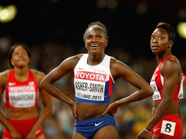 Dina Asher-Smith crosses the line in the 200m at the World Athletics Championships in Beijing on August 28, 2015