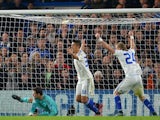 Chelsea's Bosnian goalkeeper Asmir Begovic (L) fails to save a shot by Dynamo Kiev's Austrian defender Aleksandar Dragovic (not in picture) to make it 1-1 during a UEFA Chamions league group stage football match between Chelsea and Dynamo Kiev at Stamford