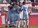 Geoffrey Kondogbia (C) of FC Internazionale Milano celebrates after scoring the opening goal with team mates during the Serie A match between Torino FC and FC Internazionale Milano at Stadio Olimpico di Torino on November 8, 2015 in Turin, Italy.