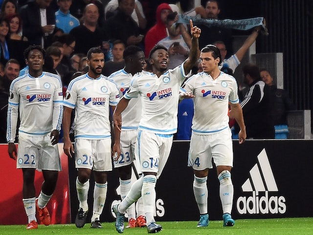 Marseille's French midfielder Georges-Kevin Nkoudou (2nd R) celebrates after scoring a goal during the UEFA Europa League football match between Marseille and Braga on November 5, 2015 at the Velodrome stadium in Marseille, southern France. 