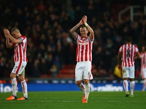 Glenn Whelan of Stoke City applauds supporters after his team's 1-0 win in the Barclays Premier League match between Stoke City and Chelsea at Britannia Stadium on November 7, 2015 in Stoke on Trent, England. 