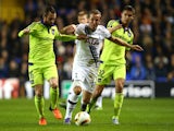 Harry Kane of Spurs is challenged by Steven Defour (L) of Anderlecht and Leander Dendoncker (R) of Anderlecht during the UEFA Europa League Group J match between Tottenham Hotspur FC and RSC Anderlecht at White Hart Lane on November 5, 2015 in London, Uni