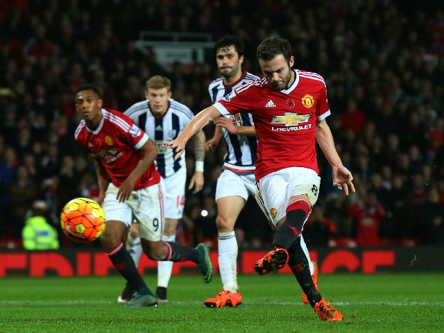 Juan Mata of Manchester United scores his team's second goal from the penalty spot during the Barclays Premier League match between Manchester United and West Bromwich Albion at Old Trafford on November 7, 2015 in Manchester, England.