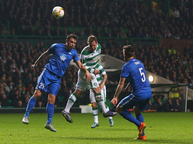 Kris Commons of Celtic scores the opening goal with a header during the UEFA Europa League Group A match between Celtic FC and Molde FK at Celtic Park on November 5, 2015 in Glasgow, United Kingdom. 
