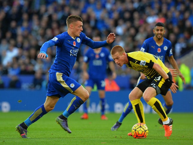 Jamie Vardy (C) of Leicester City and Ben Watson (R) of Watford compete for the ball during the Barclays Premier League match between Leicester City and Watford at The King Power Stadium on November 7, 2015 in Leicester, England. 