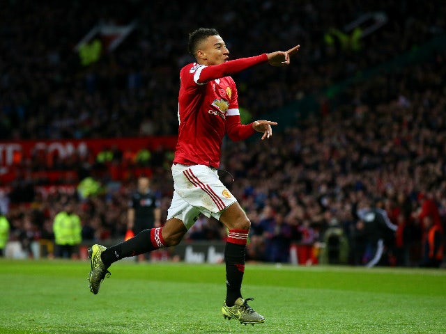 Jesse Lingard of Manchester United celebrates scoring his team's first goal during the Barclays Premier League match between Manchester United and West Bromwich Albion at Old Trafford on November 7, 2015 in Manchester, England.