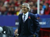 Manuel Pellegrini manager of Manchester City looks on from the touchline during the UEFA Champions League Group D match between Sevilla FC and Manchester City FC at Estadio Ramon Sanchez Pizjuan on November 3, 2015