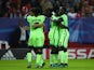 Wilfred Bony of Manchester City (2R) celebrates with team mates as he scores their third goal during the UEFA Champions League Group D match between Sevilla FC and Manchester City FC at Estadio Ramon Sanchez Pizjuan on November 3, 2015
