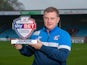 Scunthorpe United boss Mark Robins with League One's October Manager of the Month award