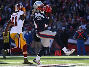 Patriots remain unbeaten by defeating Redskins
