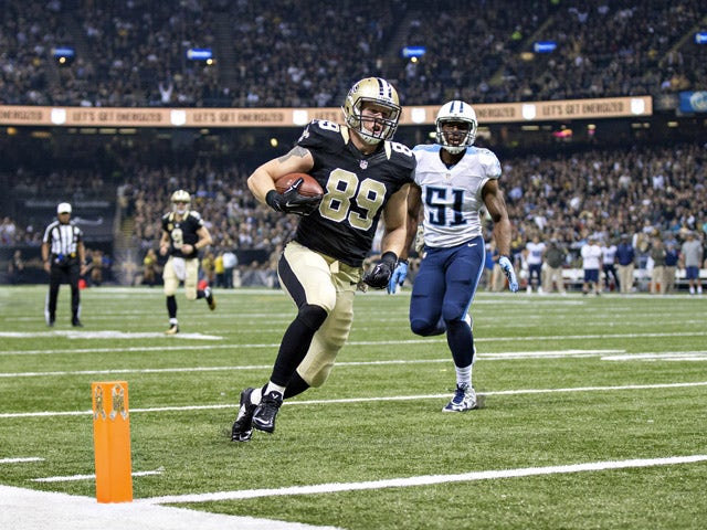 Josh Hill #89 of the New Orleans Saints runs a pass in for a touchdown in the first half of a game against the Tennessee Titans at Mercedes-Benz Superdome on November 8, 2015