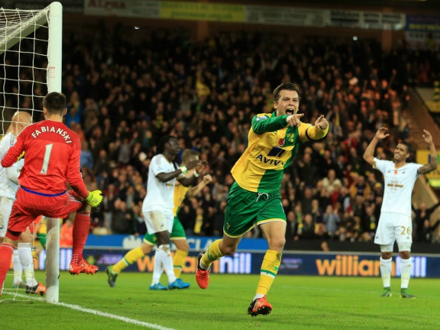 Jonathan Howson of Norwich City celebrates scoring his team's first goal during the Barclays Premier League match between Norwich City and Swansea City at Carrow Road on November 7, 2015 in Norwich, England.
