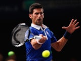Novak Djokovic of Serbia in action against Stan Wawrinka of Switzerland in their semi final match during Day 6 of the BNP Paribas Masters held at AccorHotels Arena on November 7, 2015 in Paris, France.