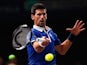 Novak Djokovic of Serbia in action against Stan Wawrinka of Switzerland in their semi final match during Day 6 of the BNP Paribas Masters held at AccorHotels Arena on November 7, 2015 in Paris, France.