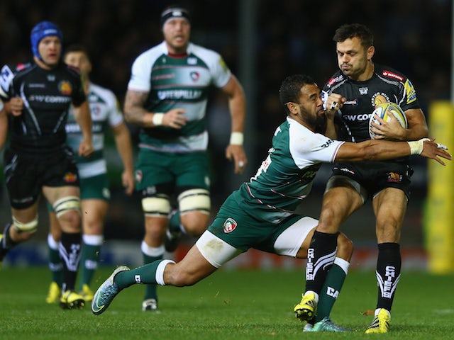 Phil Dollman (R) of Exeter Chiefs is tackled by Telusa Veainu of Leicester Tigers during the Aviva Premiership match between Exeter Chiefs and Leicester Tigers at Sandy Park on November 7, 2015 in Exeter, England.