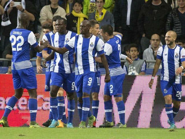 FC Porto's players celebrate after scoring during the UEFA Champions League, group G, football match between Maccabi Tel Aviv and FC Porto at the Sammy Ofer Stadium, in the Israeli coastal city of Haifa, on November 4, 2015