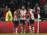PSV Eindhoven's Dutch forward Jurgen Locadia (C) celebrates with his teammates after scoring during the UEFA Champions League football match PSV Eindhoven vs VfL wolfsburg at the Philips Stadion stadium in Eindhoven on November 3, 2015