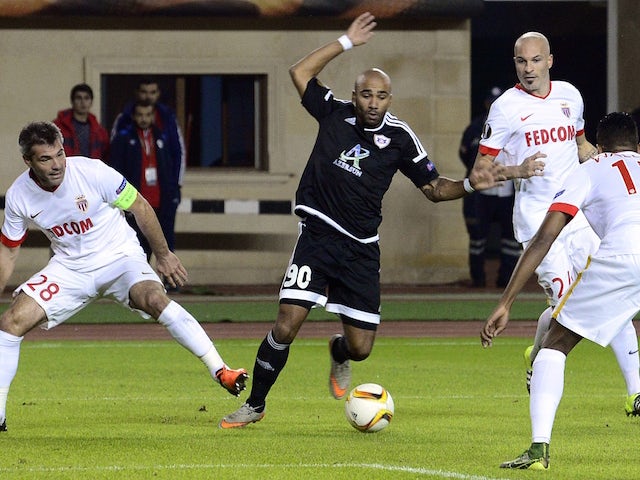 From L: Monaco's French midfielder Jeremy Toulalan, Monaco's Italian defender Andrea Raggi and Monaco's Brazilian defender Fortuna Dos Santos Wallace vie with Qarabag's forward from Sweden Samuel Armenteros (C) during the UEFA Europa League group J footba
