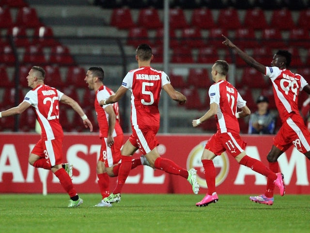 Skenderbeu's players celebrate after scoring a goal during the UEFA Europa League football match between KF Skenderbeu and Sporting Clube de Portugal at the Elbasan Arena stadium in Elbasan on November 5, 2015.