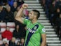 Southampton's Serbian midfielder Dusan Tadic celebrates after scoring the opening goal from the penalty spot during the English Premier League football match between Sunderland and Southampton at the Stadium of Light in Sunderland, north east England on N