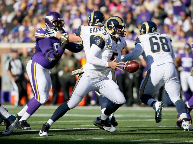 Nick Foles #5 of the St. Louis Rams looks for the hand off in the first quarter against the Minnesota Vikings on November 8, 2015