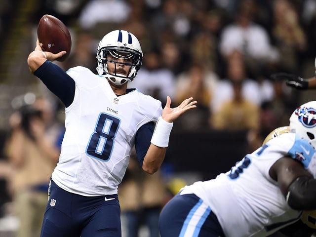Marcus Mariota #8 of the Tennessee Titans drops back to pass during the first quarter of a game against the New Orleans Saints at the Mercedes-Benz Superdome on November 8, 2015