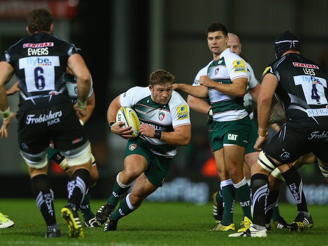 Tom Youngs (C) of Leicester Tigers runs at Mitch Lees (R) of Exeter Chiefs during the Aviva Premiership match between Exeter Chiefs and Leicester Tigers at Sandy Park on November 7, 2015 in Exeter, England. 