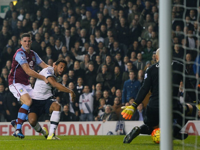 Tottenham Hotspur's Belgian midfielder Mousa Dembele (C) shoots and scores during the English Premier League football match between Tottenham Hotspur and Aston Villa at White Hart Lane in north London on November 2, 2015