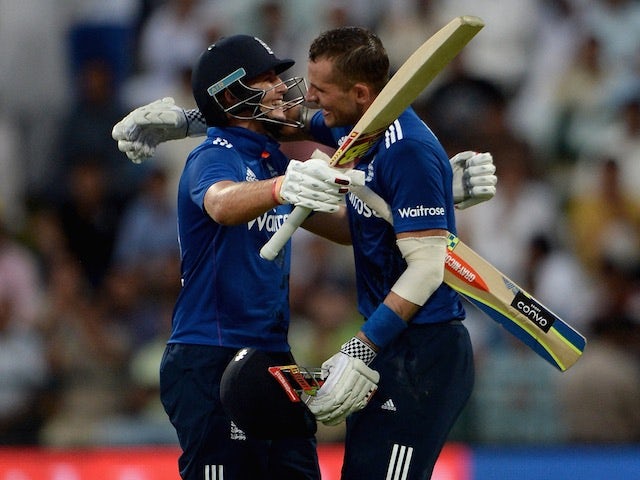 Alex Hales celebrates with England teammate Joe Root after making his maiden ODI century against Pakistan in Abu Dhabi on November 13, 2015