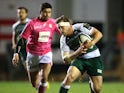 Brendon O'Connor of Leicester breaks away from Morne Steyn during the Eurpean Rugby Champions Cup match between Leicester Tigers and Stade Francais at Welford Road on November 13, 2015 in Leicester, England. 