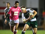 Brendon O'Connor of Leicester breaks away from Morne Steyn during the Eurpean Rugby Champions Cup match between Leicester Tigers and Stade Francais at Welford Road on November 13, 2015 in Leicester, England. 