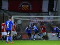 Gboly Ariyibi of Chesterfield (28) celebrates as he scores their first goal during the Emirates FA Cup first round match between FC United of Manchester and Chesterfield at Broadhurst Park on November 9, 2015