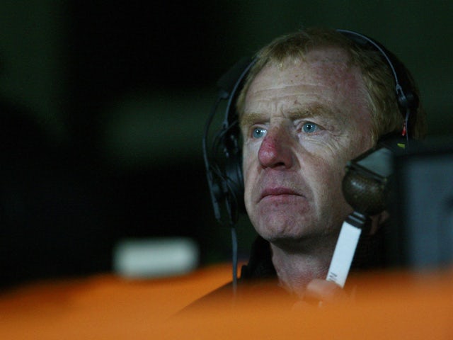 Former Liverpool player David Fairclough looks on from the stands as he commentates on the game for LFCTV during the Barclays Premier Reserve League match between Arsenal and Liverpool at the Underhill Stadium on March 16, 2011