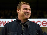 David Flitcroft, Manager of Bury smiles during the Capital One Cup second round match between Bury and Leicester City at Gigg Lane on August 25, 2015