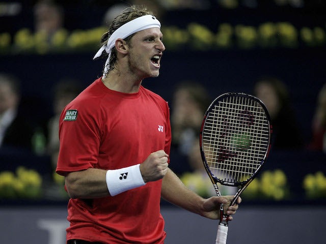 David Nalbandian of Argentina celebrates a point against Roger Federer of Switzerland in the final at the Qi Zhong Stadium , November 20, 2005 in Shanghai, China.