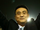 Dejphon Chansiri the Chairman of Sheffield Wednesday greets the fans prior to kickoff during the Capital One Cup fourth round match between Sheffield Wednesday and Arsenal at Hillsborough Stadium on October 27, 2015 in Sheffield, England.