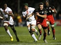 Duncan Taylor of Saracens breaks away from Thierry Dusautoir during the European Rugby Champions Cup match between Saracens and Toulouse at Allianz Park on November 14, 2015 in Barnet, England.