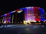 The Friends arena in Solna near Stockholm is lit with national colours of France ahead the Euro 2016 play-off football match between Sweden and Denmark on November 14, 2015.