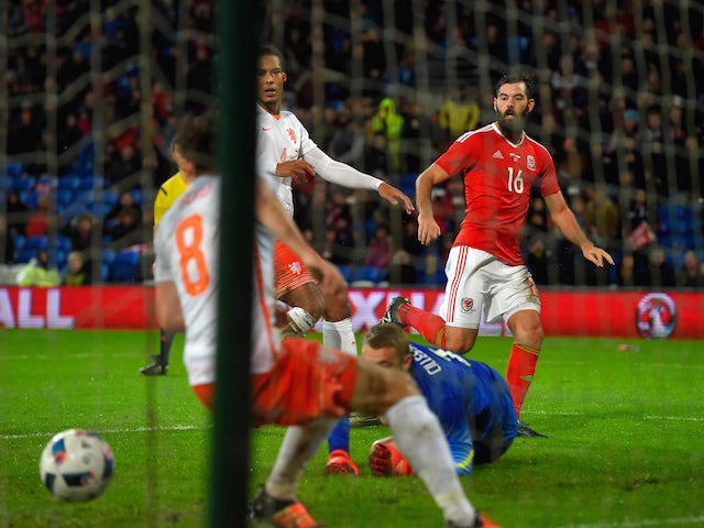 Wales player Joe Ledley scores the first Wales goal during the friendly International match between Wales and Netherlands at Cardiff City Stadium on November 13, 2015 in Cardiff, Wales.