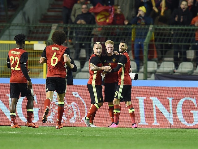 Belgium's Kevin De Bruyne (3R) celebrates scoring during the friendly international match between Belgium and Italy at Baudoin King Stadium in Brussels, on November 13, 2015.