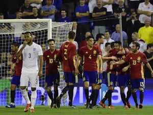 Spain's forward Mario (2ndR) celebrates with teammates after scoring during the friendly football match Spain vs England at the Jose Rico Perez stadium in Alicante on November 13, 2015. 